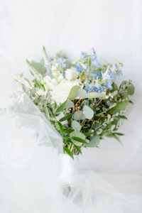 Wedding Bride Bouquet with Eucalyptus Greenery and White Roses and Blue Delphinium