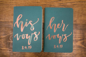 His and Hers Green Wedding Vows Booklets | Wedding Photographer Carrie Wildes Photography