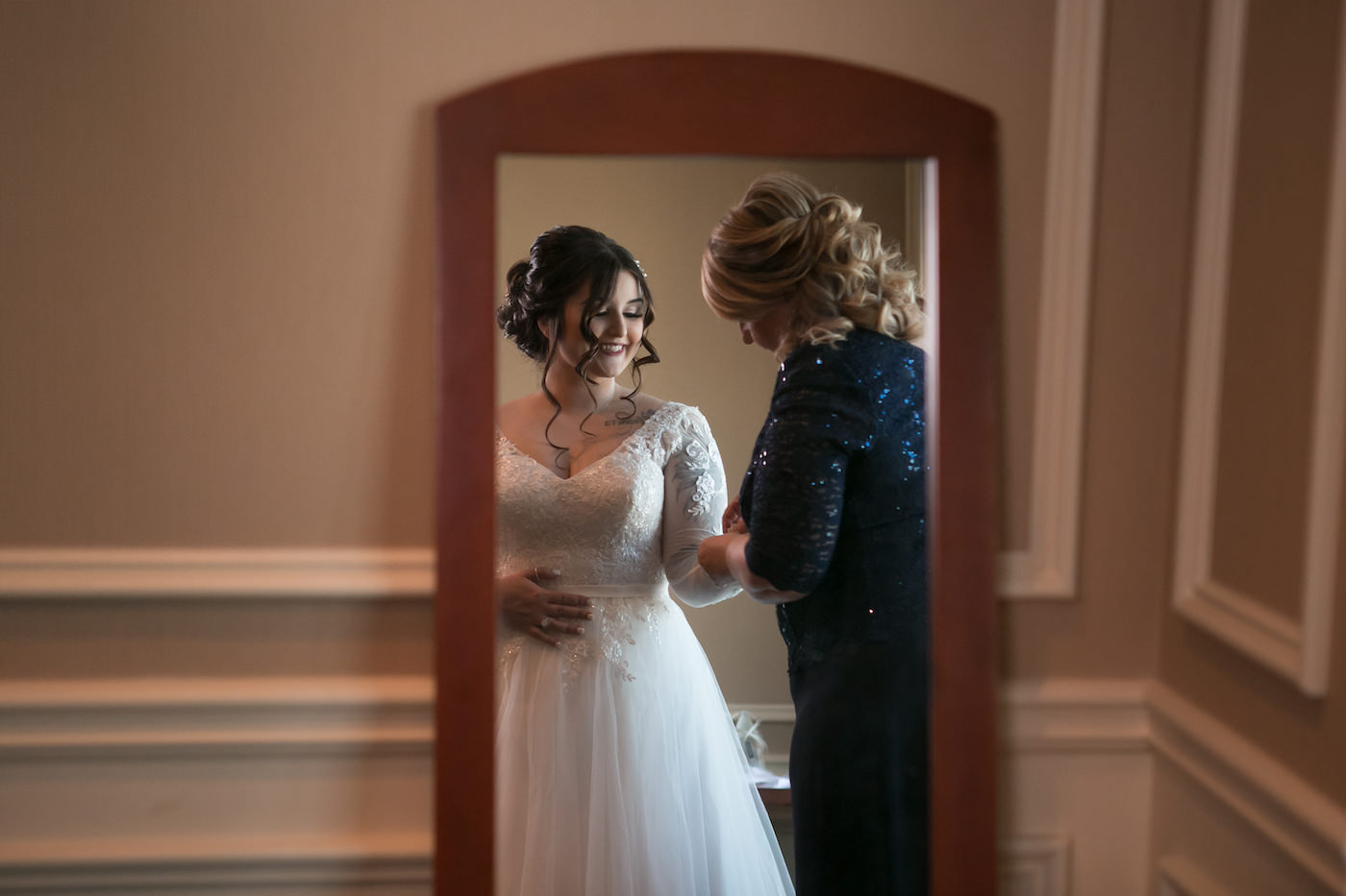 Tampa Bride in Whimsical Lace Long Sleeve V Neckline Empire Waist Wedding Dress with Mom Portrait | Wedding Photographer Carrie Wildes Photography | Wedding Hair and Makeup Michele Renee the Studio