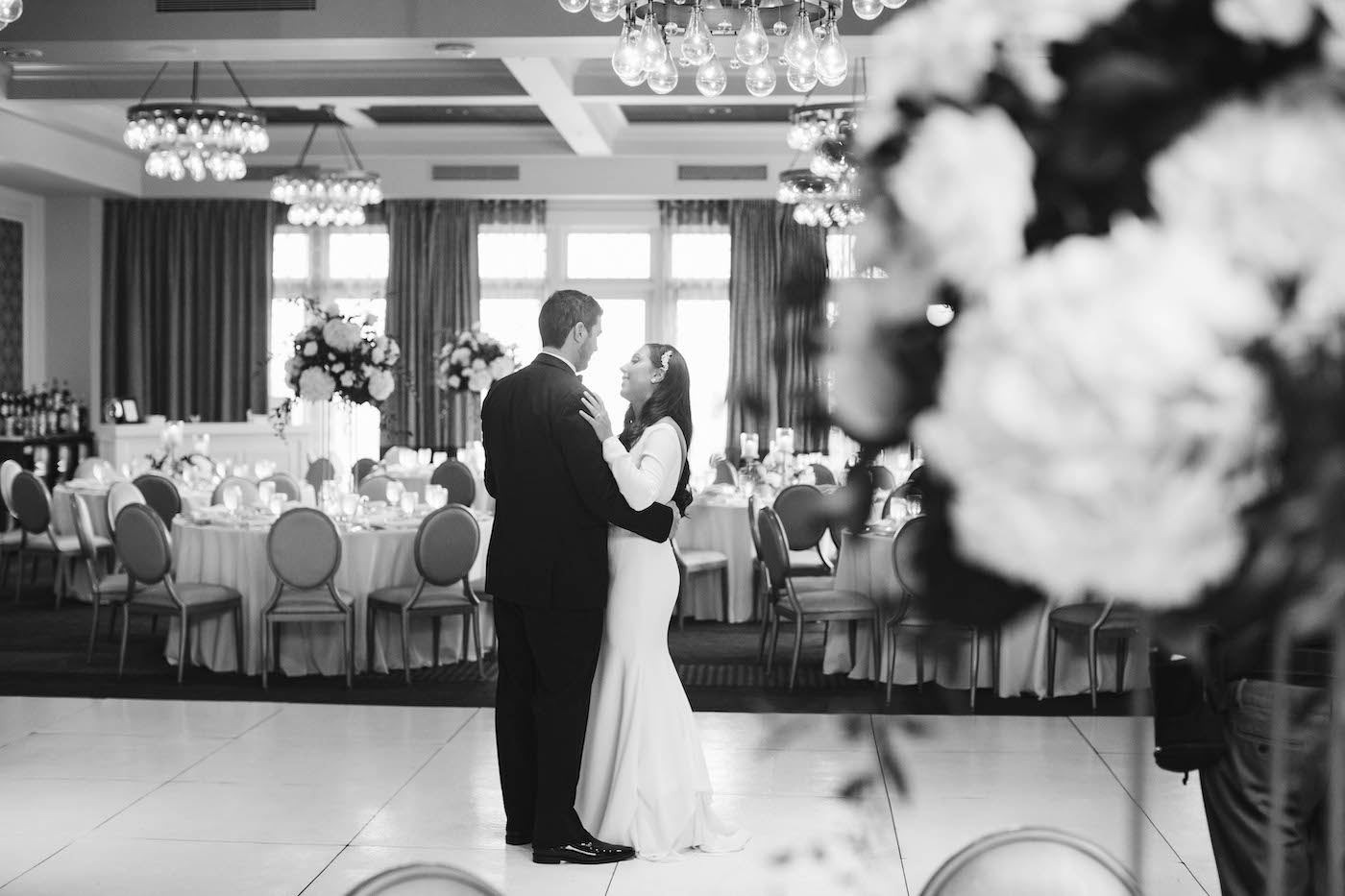 Classic Florida Bride and Groom Dance in Wedding Reception Ballroom Before Guests Arrived | Tampa Bay Boutique Hotel and Venue The Birchwood | Downtown St. Pete Florist Bruce Wayne Florals | Grant Hemond and Associates Wedding DJ