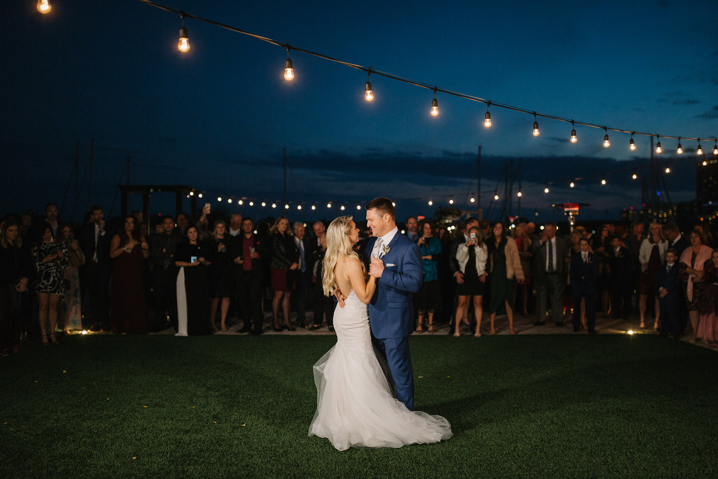 Tampa Bay Bride and Groom First Dance on Lawn of the Esplanade Location of Wedding Venue The Vinoy Renaissance Resort in Downtown St. Petersburg, String Lights | Florida Luxury Wedding Planner Parties A’ La Carte | Wedding DJ Grant Hemond and Associates
