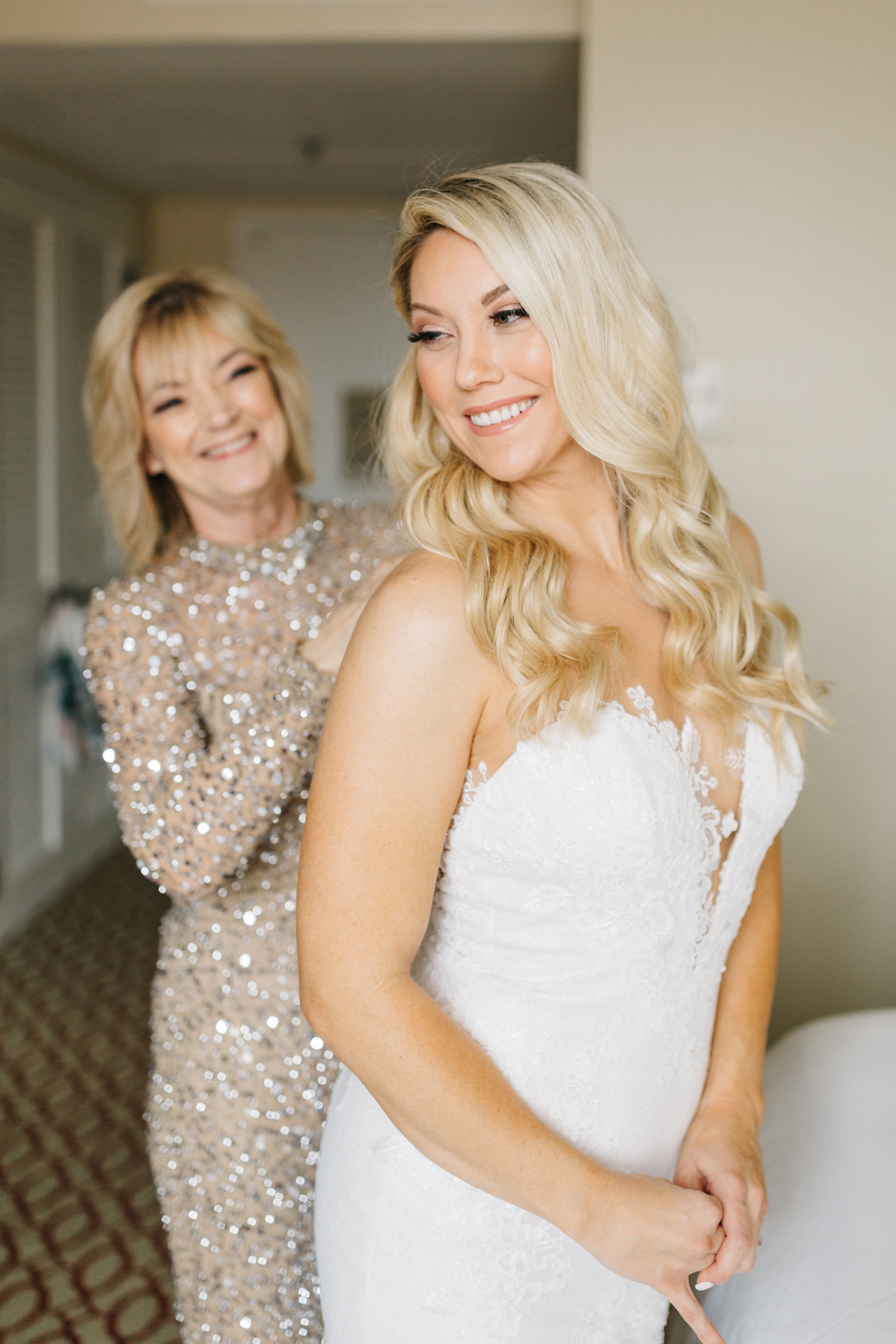 Classic Tampa Bay Bride and Mother Getting Ready Photo Portrait, Ashley Stegbauer Morrison Wearing Boho Chic Inspired Ines Di Santo Wedding Dress, Lace Fit and Flare with Plunging Neckline | Luxury Florida Wedding and Bridal Dress Shop Isabel O’Neil Bridal Collection