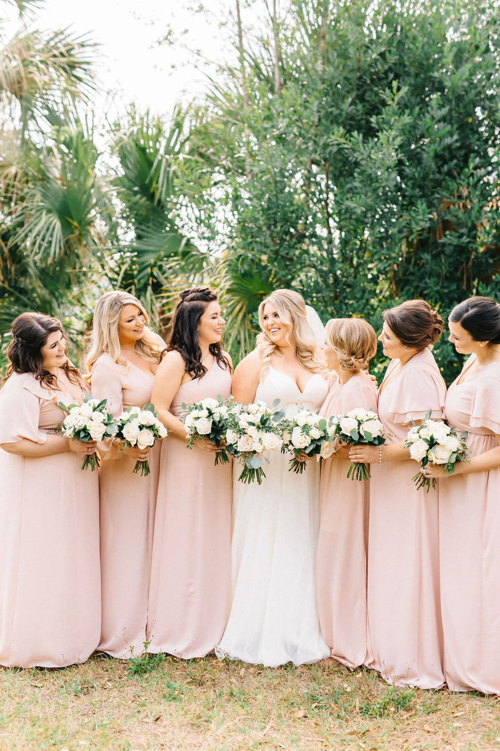 Tampa Bay Brides and Bridesmaids, Florida Bridal Party in Long Floor Length Mix and Match Blush Pink Dresses from Show Me Your Mumu, Holding Elegant White and Ivory Floral Bouquets |Tampa Bay Wedding Planner UNIQUE Weddings and Events