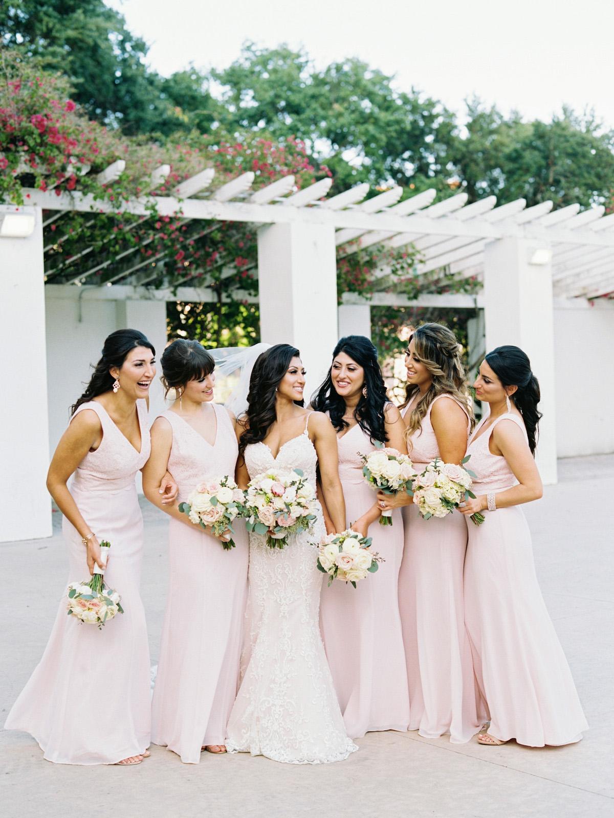 Bride and Bridesmaids Portrait Outdoor Vinoy Park St. Pete | Blush Pink Bridesmaids Dresses with Blush and White Rose Bouquets