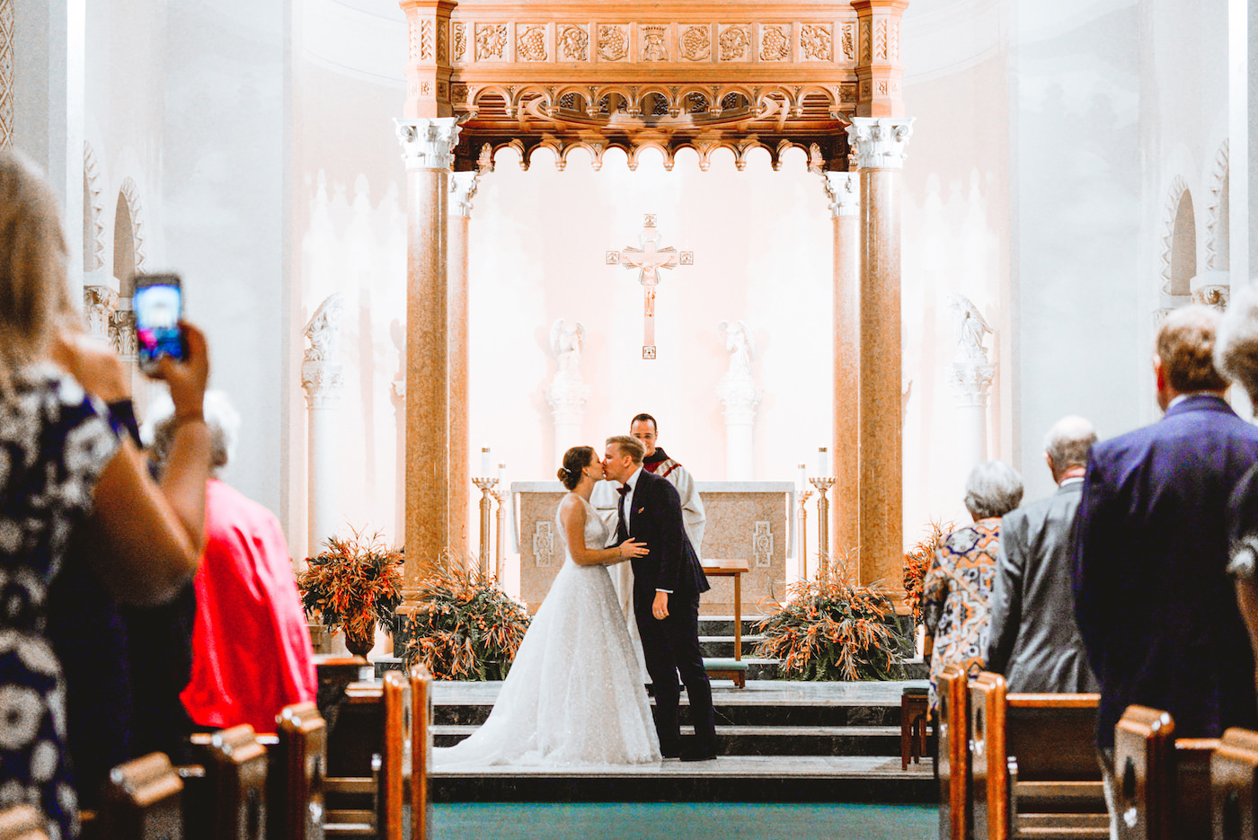 Bride and Groom First Kiss | Indoor Church Catholic Wedding Ceremony in St. Pete Florida