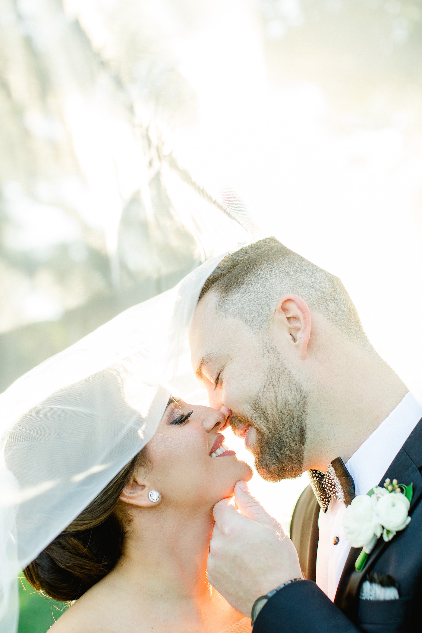 Classic Florida Bride and Groom Wedding Portrait, Intimate Kiss under Bridal Veil