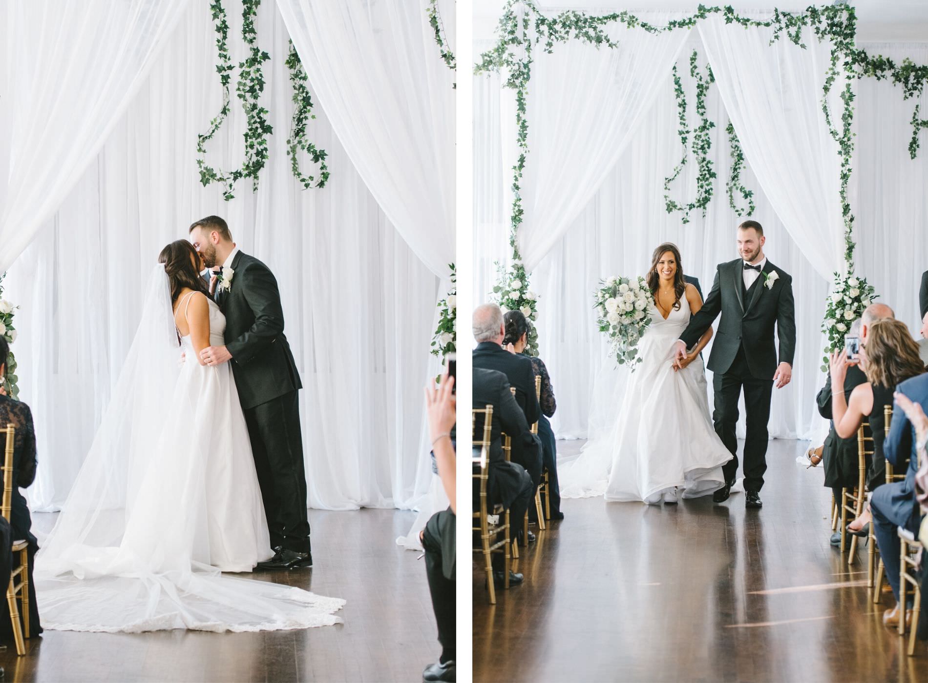 Florida Bride and Groom Exchanging Wedding Vows During Ceremony | White Linen Draping with Lush Greenery Garland and Arrangements | Tampa Bay Wedding Photographer Kera Photography | Tampa Bay Wedding Planner Breezin' Weddings | Historic Wedding Venue The Orlo