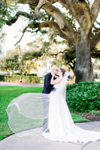 Romantic Classic Bride and Groom Veil Blowing Portrait | Wedding Photographer Shauna and Jordon Photography | Tampa Wedding Planner UNIQUE Weddings + Events