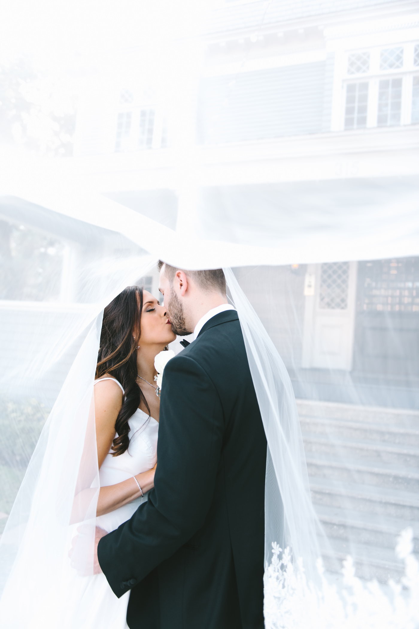 Romantic Bride and Groom Creative Wedding Portrait Under Bride Veil | Tampa Bay Wedding Photographer Kera Photography