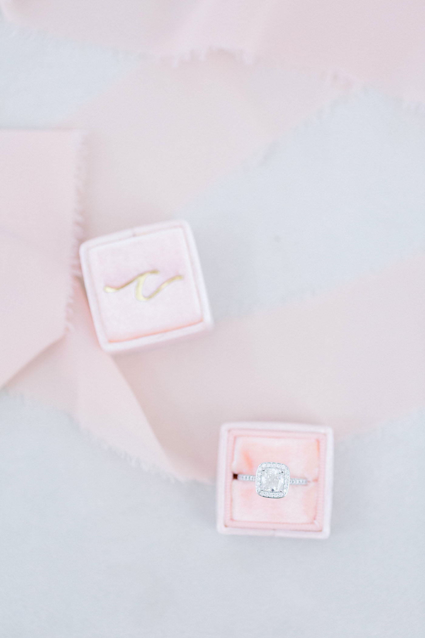 Wedding Ring Photo Shot | Pink Velvet Ring Box with Cushion Cut Engagement Ring with Halo and Channel Set Diamonds