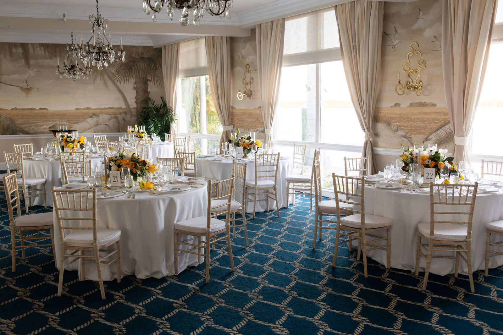 Elegant Nautical Ballroom Wedding Reception Decor, Round Tables with White Linens, Gold Chiavari Chairs, Low Centerpieces, Yellow and Greenery Florals | Tampa Bay Wedding Planner Parties A'la Carte | Clearwater Beach Wedding Venue Carlouel Yacht Club