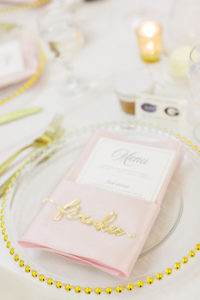 Classic Florida Wedding Reception Table Decor, Clear Glass Charger with Gold Beaded Rim Detailing, Blush Pink Linens with Printed Menu, Gold Laser Engraved Name for Place card | Florida Wedding Planner Breezin' Weddings