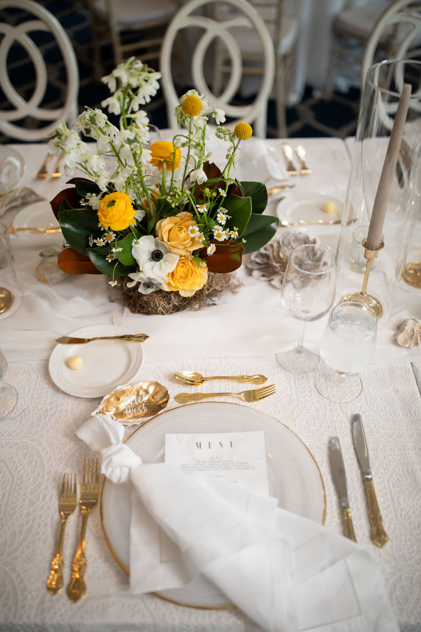 Elegant Nautical Wedding Reception Decor, Gold Rimmed Charger, White Linens, Gold Flatware, Low Yellow, White and Greenery Floral Centerpiece | Tampa Bay Wedding Planner Parties A'la Carte