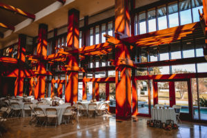 St. Pete Wedding Venue The Poynter Institute | Indoor Lobby Reception Space with Wood Beams Architecture