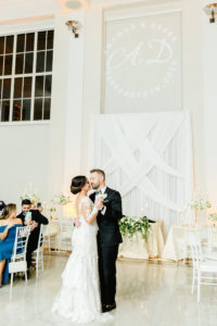 Timeless Elegant Tampa Bay Bride and Groom First Dance During Wedding Reception Portrait | Florida Wedding Venue The Vault | Tampa Wedding Planner Breezin' Weddings