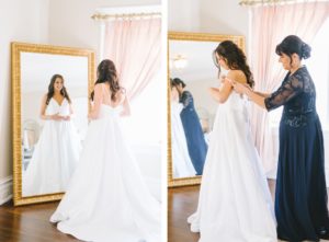 Romantic Classic Bride in Deep V Neckline Spaghetti Strap A-Line Wedding Dress and Mom in Navy Blue Lace Dress Getting Ready Wedding Portrait | Tampa Bay Wedding Photographer Kera Photography