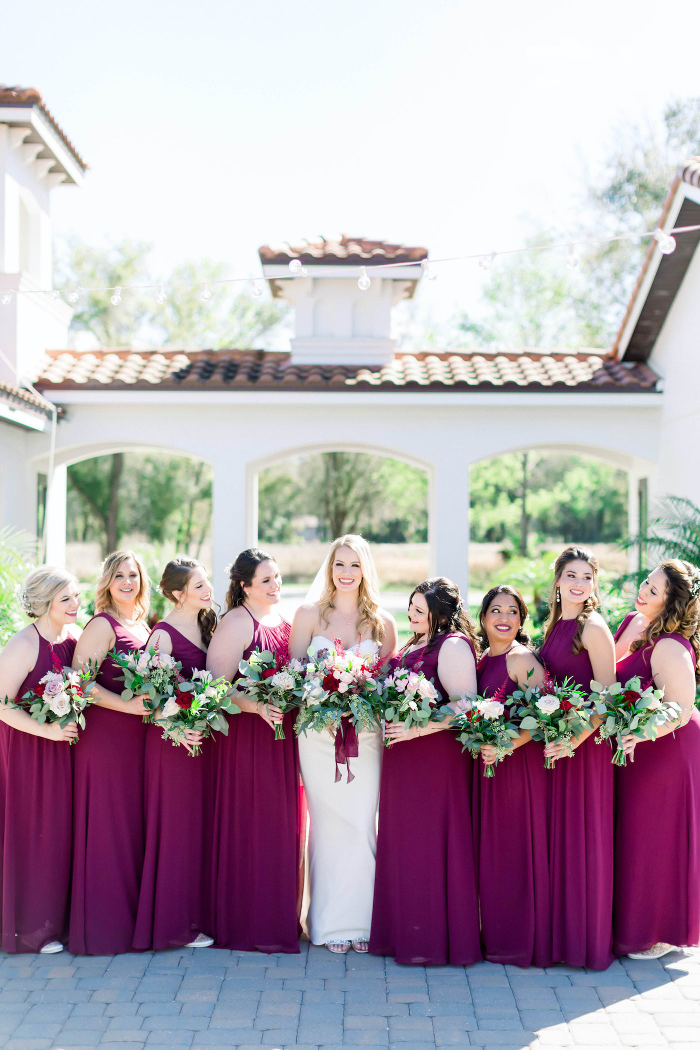 Burgundy Bordeaux Wine Deep Red Long Chiffon Bridesmaid Dresses | Outdoor Florida Wedding Bride and Bridesmaids Portrait | Burgundy and Blush Pink Bridal Bouquet with Roses and Astilbe and Eucalyptus Greenery | Shauna and Jordon Photography