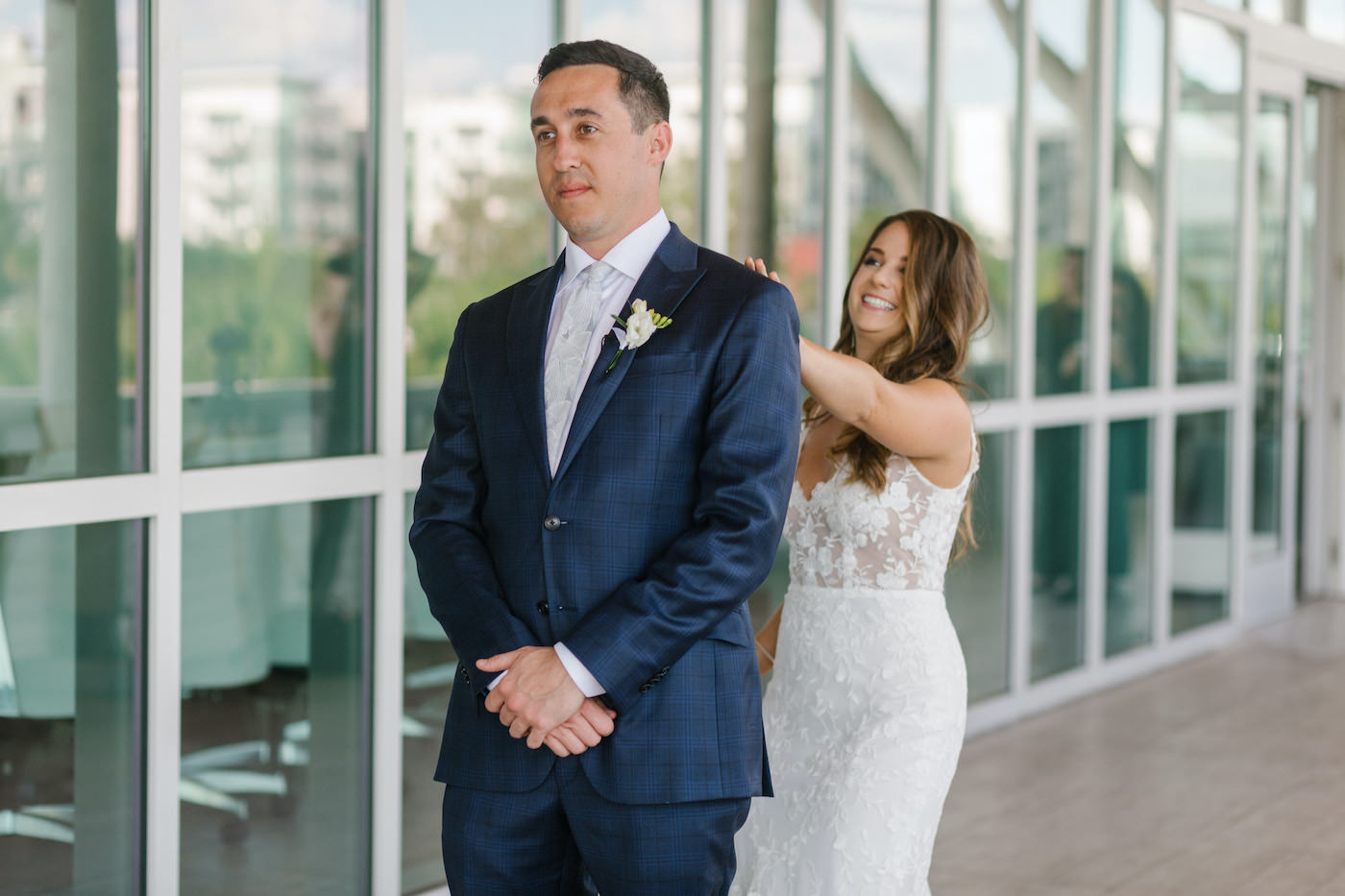 Bride and Groom First Look | Groom in Classic Navy Blue Suit with Silver Neck Tie