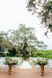 Romantic, Garden Inspired Wedding Ceremony, Large Floral Decor, With Gold Vases, Blush Pink Florals with Greenery, White Flower Petals Down Aisle with Runner, White Chiavari Chairs | Florida Wedding Planner NK Weddings | Marie Selby Botanical Gardens