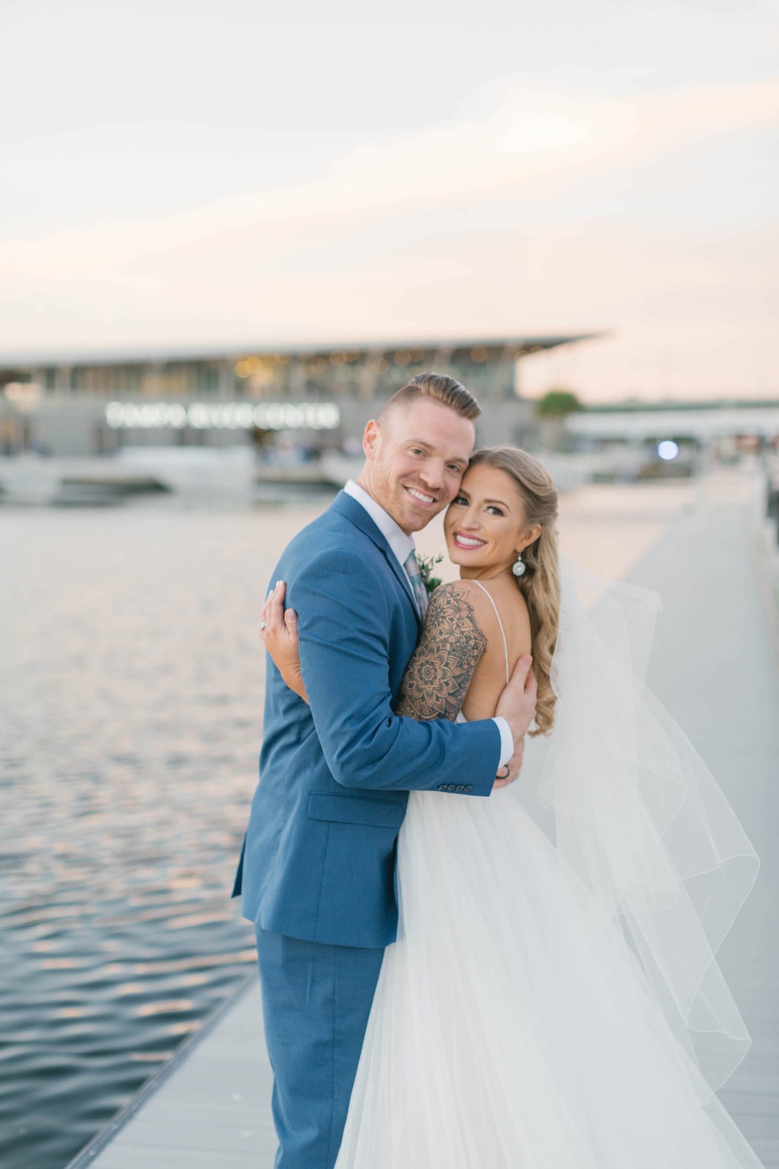 Tampa Bay Sunset Waterfront Bride and Groom Wedding Portrait on Boat Dock