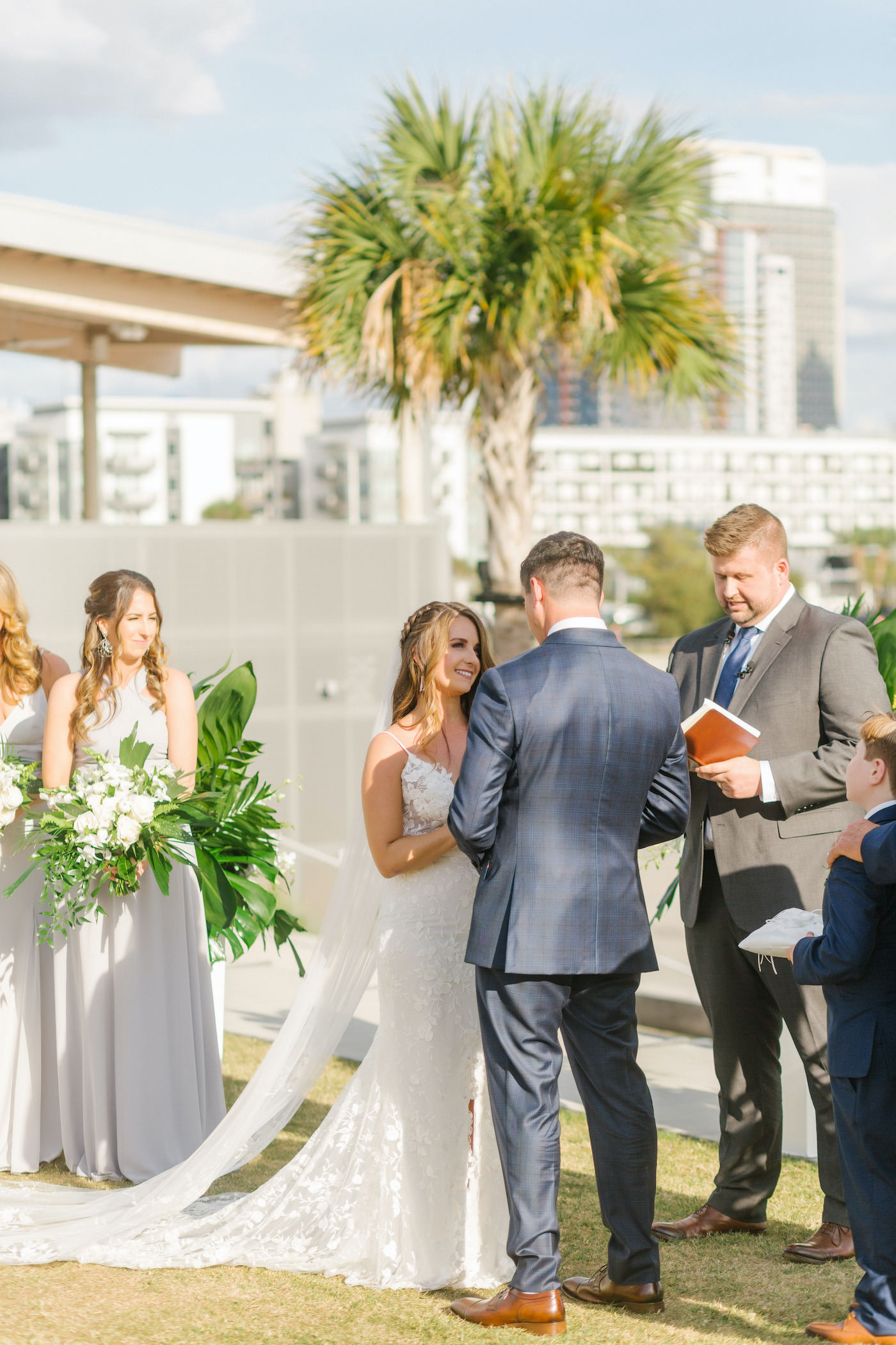 Bride and Groom Exchanging Vows during Tropical Florida Wedding Outdoor Downtown Tampa Ceremony
