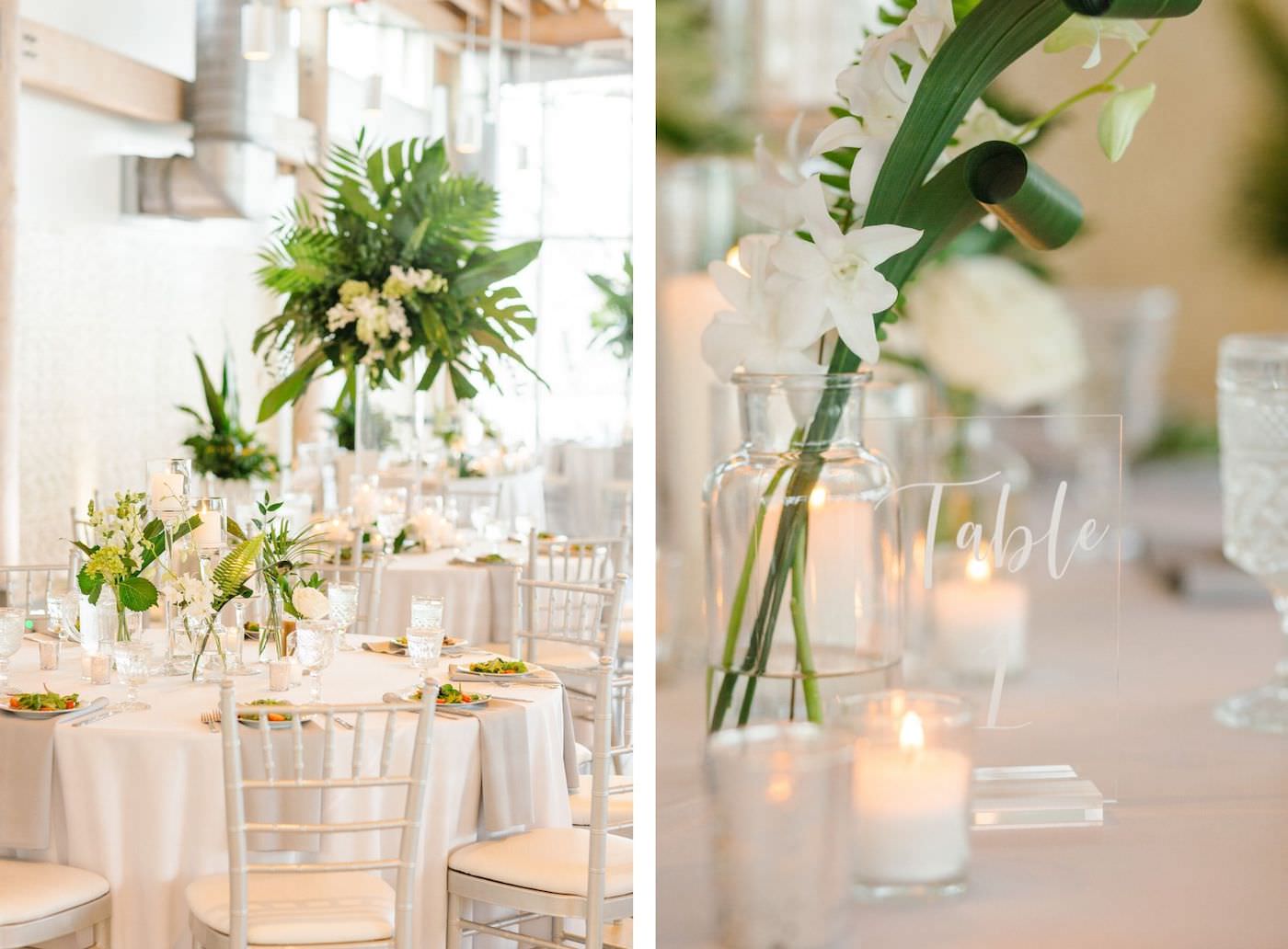 Tropical Tampa Florida Wedding Reception | White Wedding Table with Silver Chiavari Chairs and Grey Napkins and Tropical Palm Leaf Centerpiece with White Orchids | Tampa Wedding Florist Bruce Wayne Florals | Clear Acrylic Table Number with Calligraphy