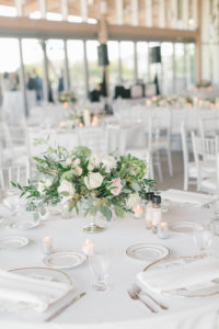 Elegant Boho Chic Wedding Reception Decor, Gold Rimmed Chargers, Low Greenery and Ivory Roses Centerpiece, White Linens | Tampa Bay Wedding Planner Parties A'la Carte | Wedding Florist Bruce Wayne Florals | Wedding Chargers Rentals Gabro Event Services