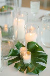 Tropical Tampa Florida Wedding Centerpiece with Palm Frond Leaf and Candles | Tampa Wedding Florist Bruce Wayne Florals