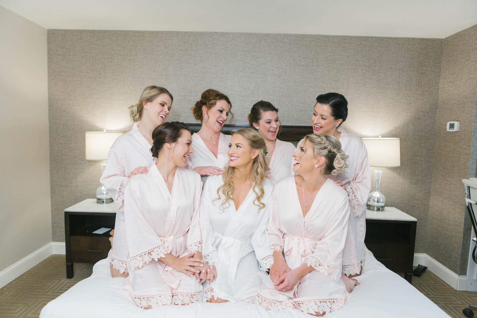 Classic Bride and Bridesmaids in Matching Blush Pink Lace Trim Robes
