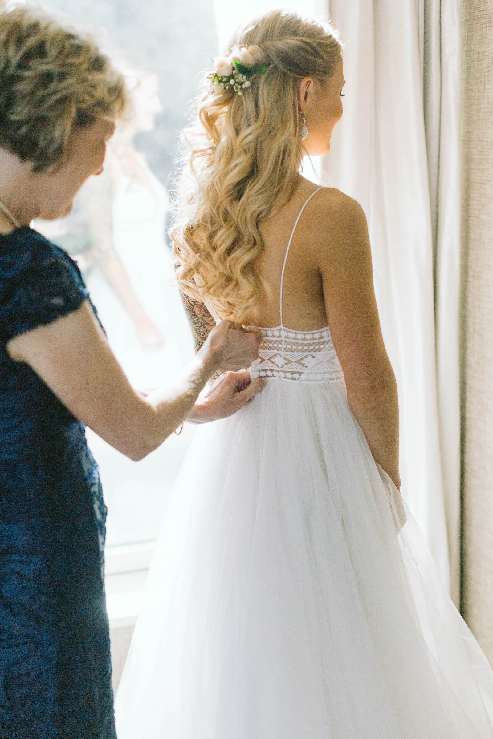 Classic Bride Getting Ready Wedding Portrait with Mom Wearing Boho Chic Wedding Dress with Delicate Lace Back Detail