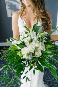 Tampa Wedding Florist Bruce Wayne Florals | Florida Tropical Wedding Bridal Bouquet with Greenery Palm Fronds and Ferns and White Roses Orchids and Snapdragons