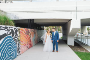 Florida Bride and Groom First Look Wedding Portrait Under Intracoastal Bridge