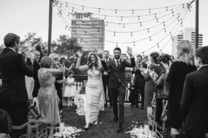 Modern Rooftop Wedding Ceremony with City Skyline and Market String Lights | Unique, Historic Downtown St. Pete Wedding Venue Station House