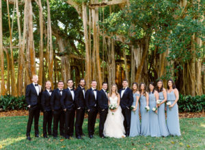 Florida Modern Wedding Party, Large Bridal Party, Bridesmaids in Mix and Match Slate Gray Dresses, Groom and Groomsmen in Classic Back Tuxedos with Bowties | Sarasota Wedding Planner NK Weddings