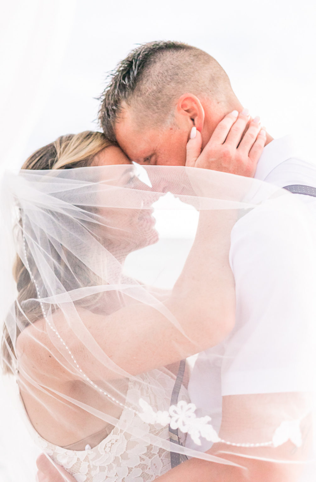 St. Petersburg Florida Beach Wedding Ceremony | Outdoor Bride and Groom Portrait Veil Shot