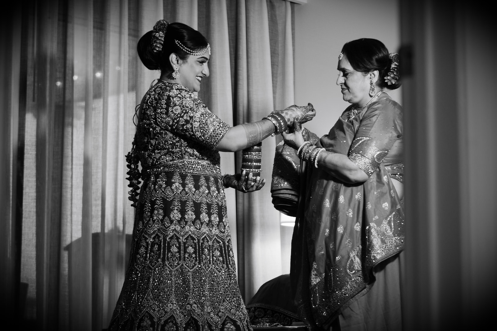 Black and White Wedding Photography | Indian Wedding Tampa Florida | Mother of the Bride Helping Bride Get Dressed