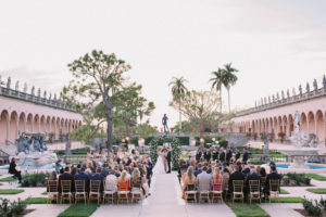 Whimsical, Garden-Inspired Florida Wedding Ceremony at Sunset, Bride and Groom exchange Vows | Sarasota Wedding Planner NK Weddings | The Ringling Museum of Art Courtyard