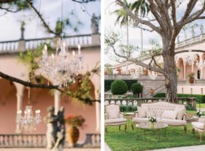 Modern Day Fairytale Florida Wedding Outdoor Reception and Decor, Vintage Pink Sitting Lounge, Couch, Armchair, Luxury Cocktail Hour Setup with Crystal Hanging Chandeliers and Illuminating Lighting | Museum of Art Courtyard at The Ringling | Sarasota Wedding Planner NK Weddings