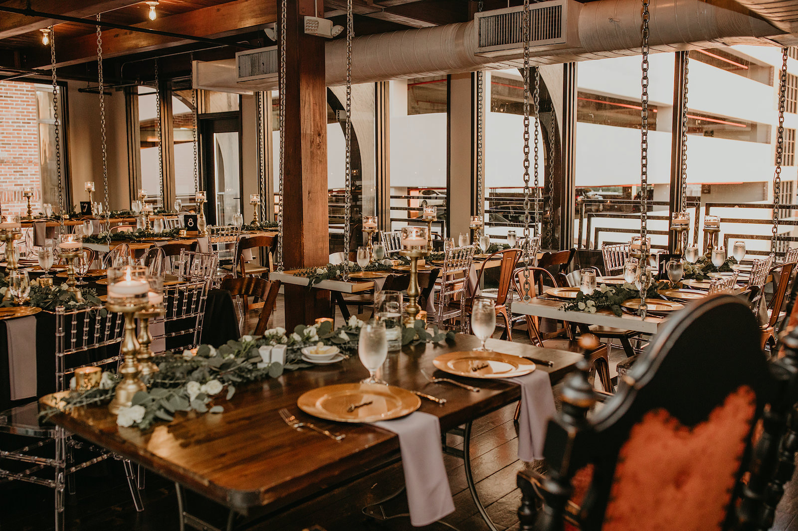 Boho Industrial Wedding Reception with Wooden Tables and Greenery | Unique, Historic Downtown St. Pete Wedding Venue Station House | St. Petersburg Wedding Planner Blue Skies Events