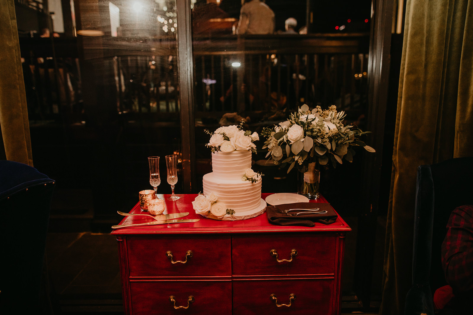 Simple, Elegant Boho Two-Tier White Wedding Cake on Vintage Red Dessert Table