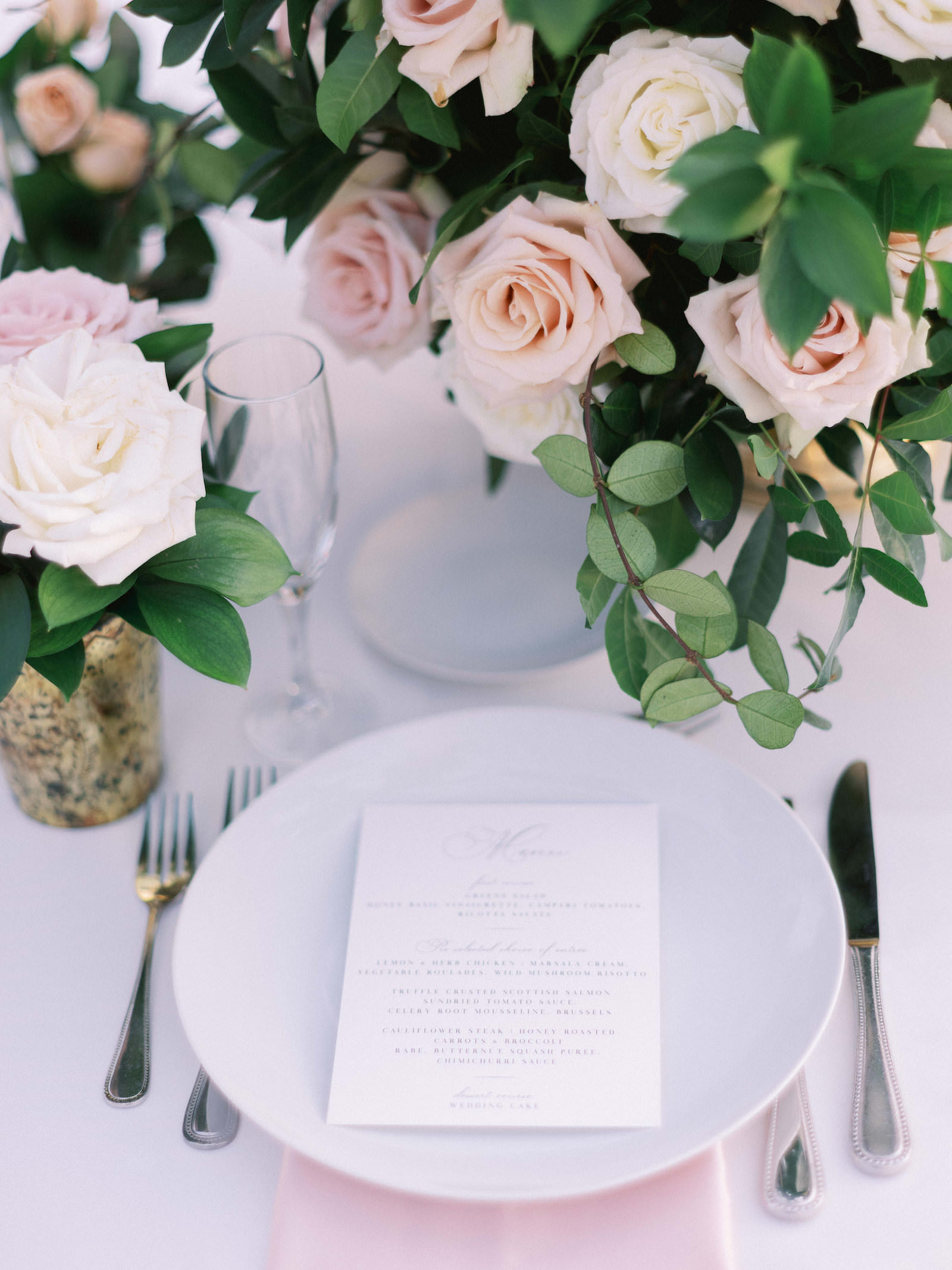 Romantic, Florida Wedding Pacesetting, Ivory Paper Menu, Floral Centerpiece with Blush Pink, and Ivory, Blush Pink Linens, Elegant Flatware | Florida Wedding Planner NK Weddings