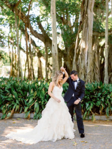 Florida Bride and Groom Dance Outside, Classic Bride and Groom Have Fun Candid Moment Portrait | Sarasota Wedding Planner NK Weddings