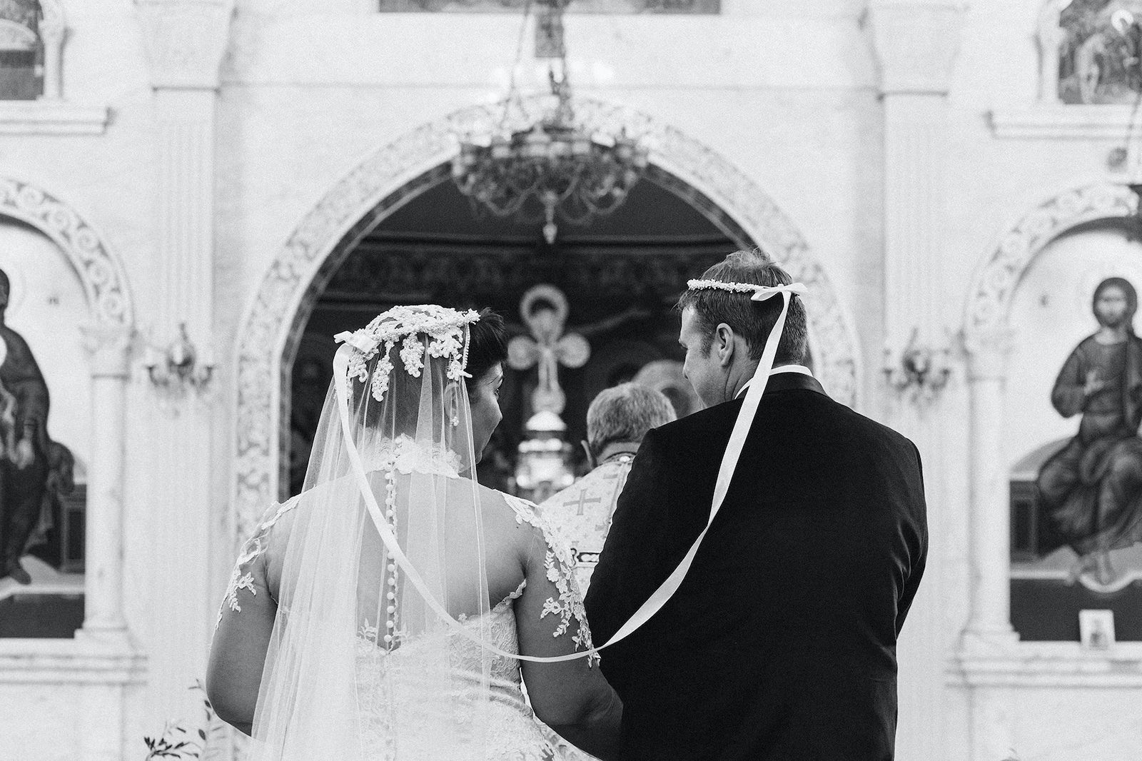Halo Ceremony during St. Petersburg Florida Traditional Greek Orthodox Church Wedding Ceremony