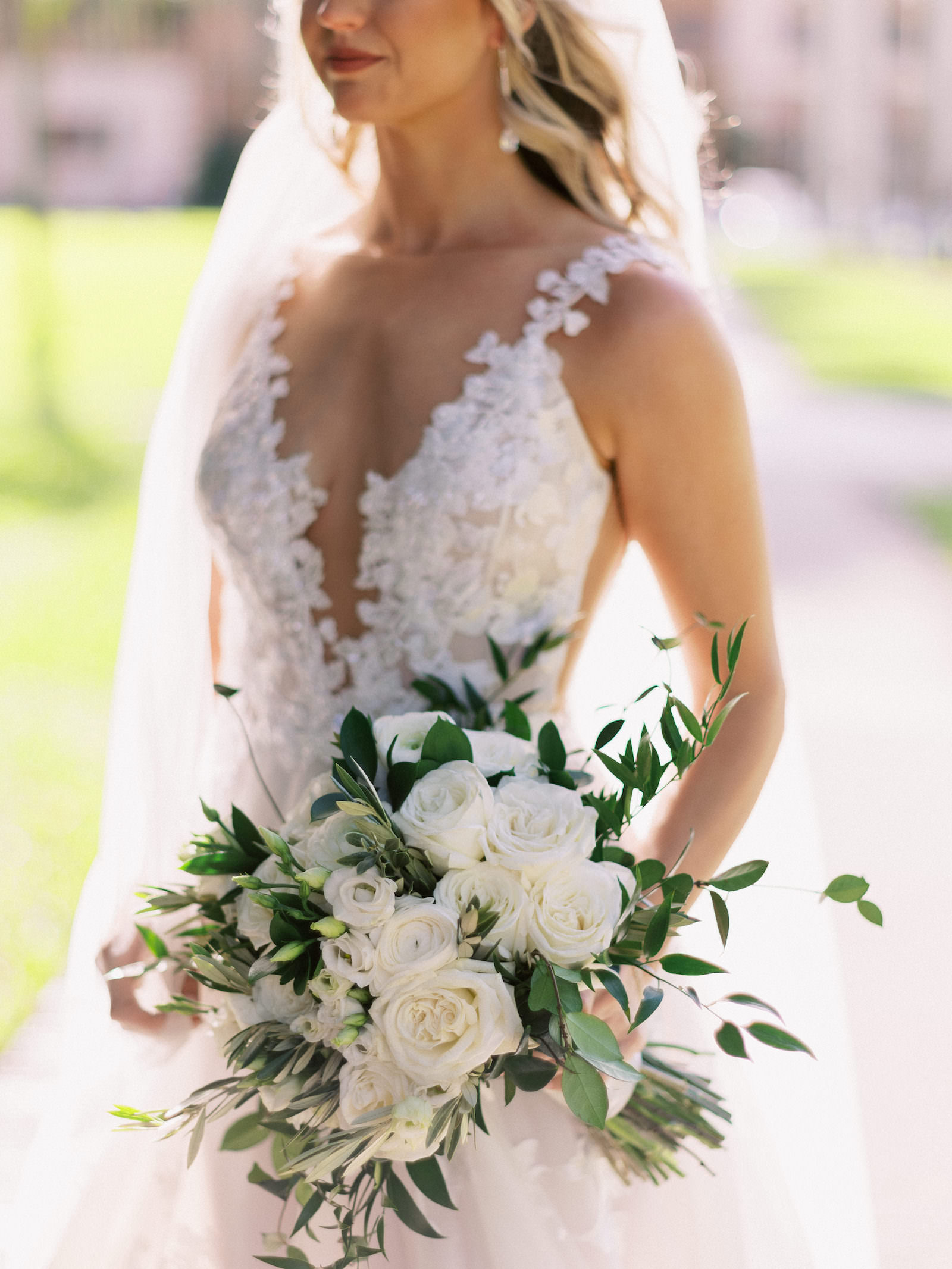 Florida Bride Holding Whimsical Inspired Bridal Bouquet, Ivory Florals and White Roses with