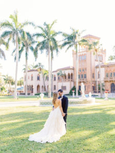 Romantic, Modern Florida Bride and Groom In Courtyard in Ringling Mansion Belvedere Tower | Sarasota Wedding Planner NK Weddings