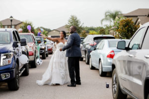 Florida Bride and Groom During COVID Wedding Reception, Drive By Honk and Cheer for The Newlyweds at Valrico Private Residence Reception | Tampa Bay Wedding Photographer Lifelong Photography Studios | Ballgown Lace and Tulle Wedding Dress Isabel O'Neil Bridal