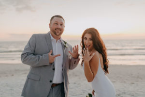 Light Blue Grey Groom Suit | Outdoor Bride and Groom Beach Portrait at Tampa St Pete Florida COVID Destination Elopement Beach Wedding Ceremony | Amber McWhorter Photography