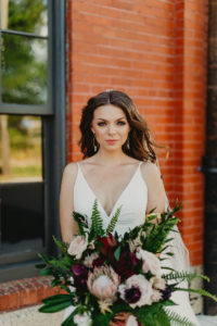 Outdoor Tampa Wedding Bridal Portrait | Wild Boho Loose Organic Greenery Bridal Bouquet with Ferns Blush Pink Roses and Protea and Red Amaranthus | Dewitt for Love Photography