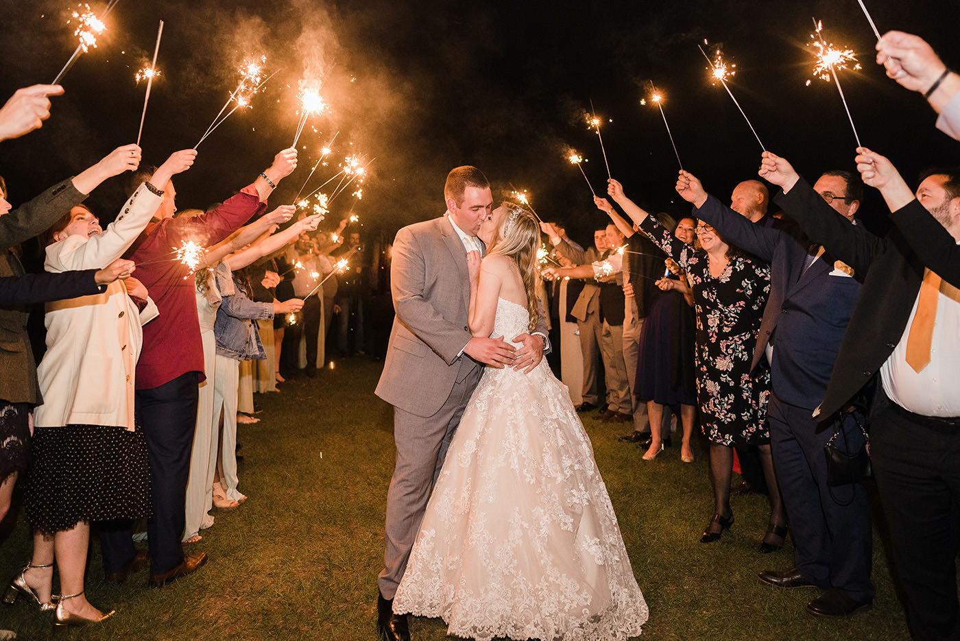 Florida Bride and Groom Kiss at End of Night Sparkler Wedding Exit