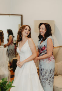Mother of the Bride Helping Bride Get Dressed and Dressed | V Neck Bridal Gown Spaghetti Strap A Line Kate McDonald Ballgown | Dewitt for Love Photography